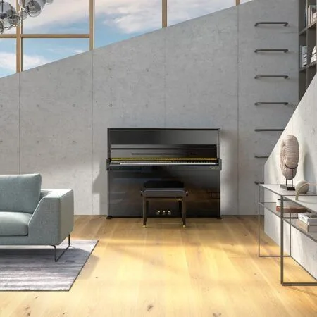 Modern living room with a sleek fireplace and minimalist furniture.