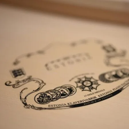 A detailed vintage-style illustration of a ship's wheel and nautical elements.
