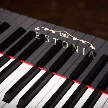 Close-up of Estonia piano keys with the year 1883 on the logo.