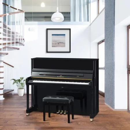 Elegant black upright piano in a modern, bright living space.