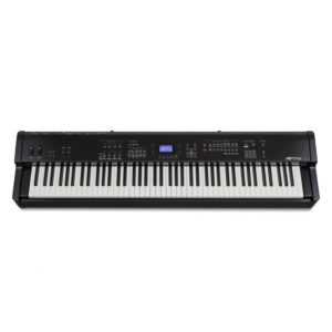 Digital piano keyboard with control panel and display.